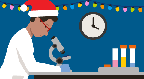 A person looking through a microscope